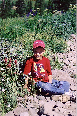 Ouray trip 05 Matthew by the flowers.jpg